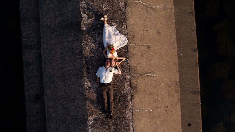 Breakwall in Marquette, MI of wedding couple