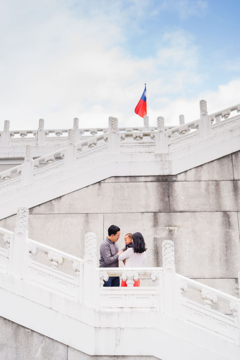 family on the stairs of the National Palace Museum