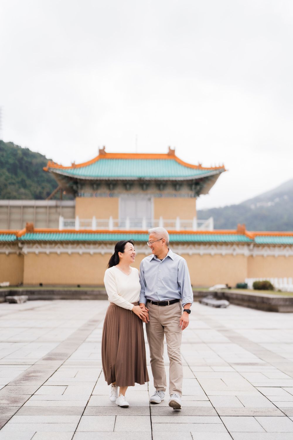 married couple walking in National Palace Museum
