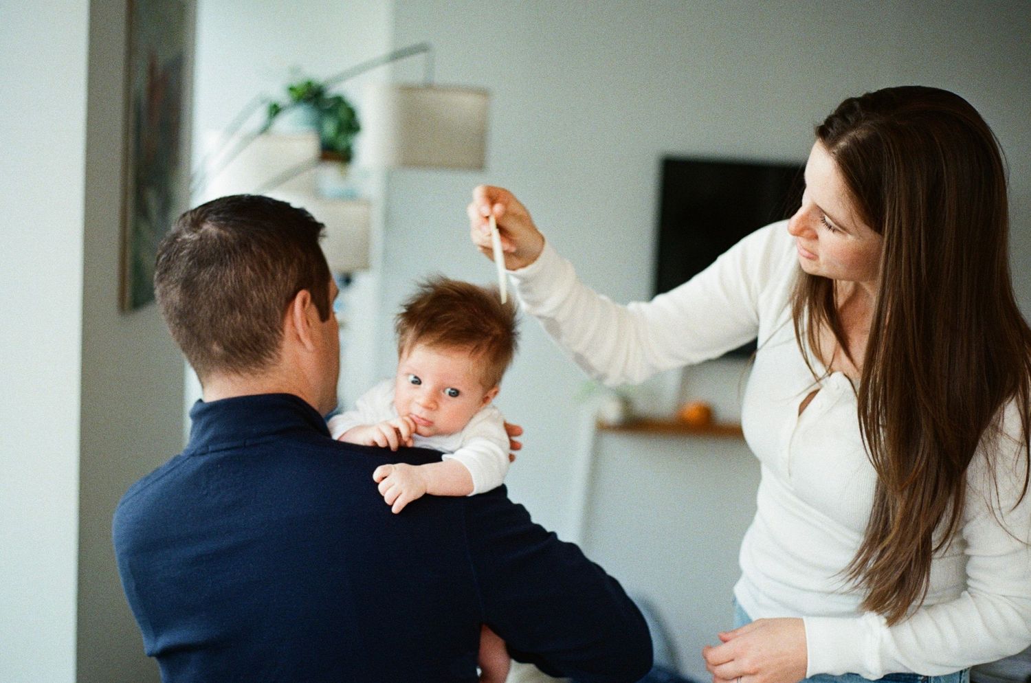 lifestyle family session on 35mm film with movement, connection and documentary style