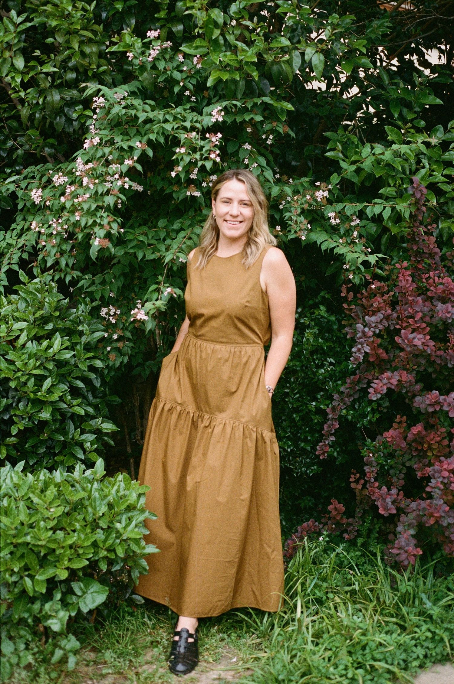 romantic film portrait photography in Paris park with natural light, soft textures and elevated, timeless style