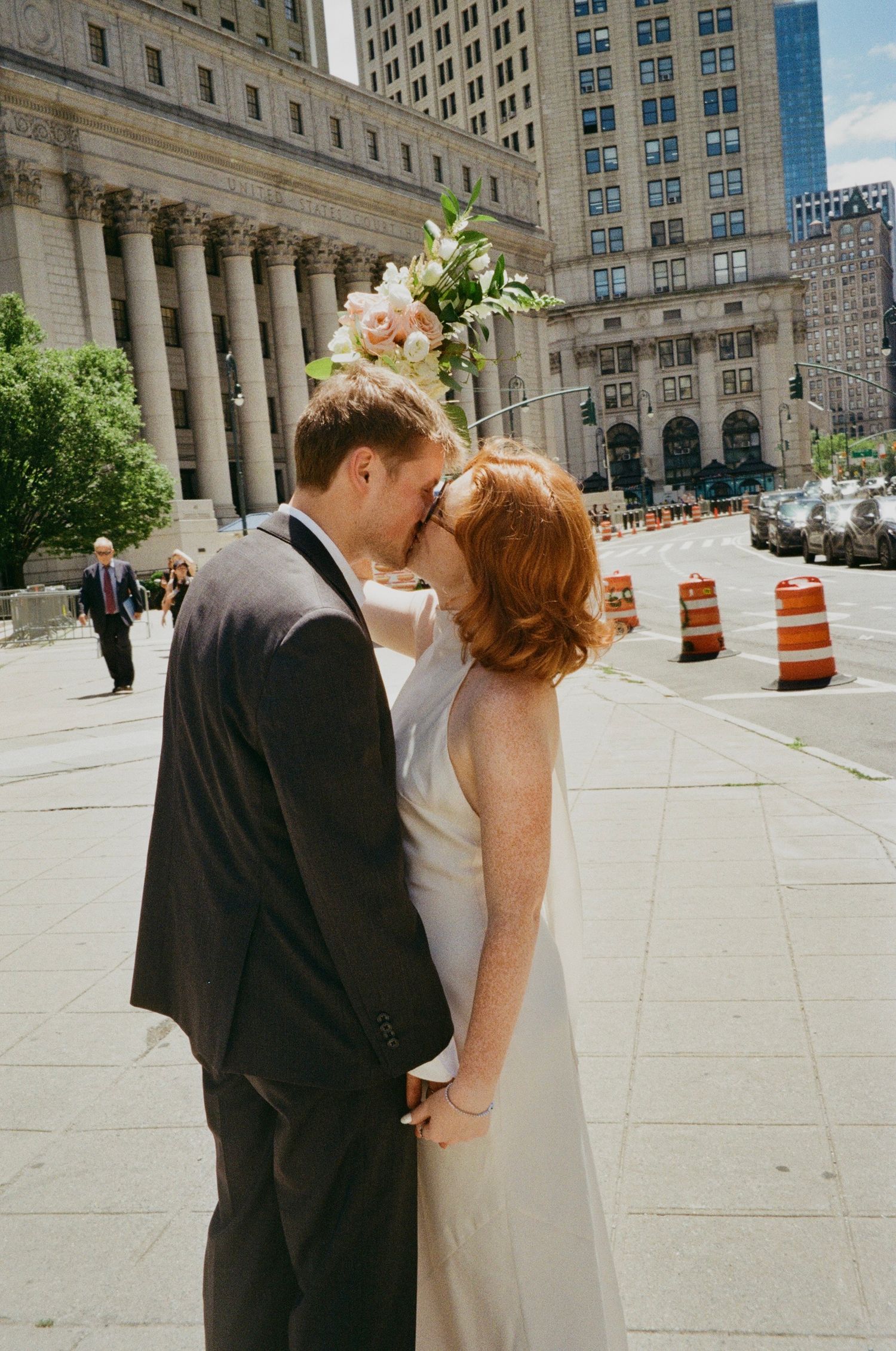 Luxury NYC elopement photographer capturing romantic courthouse wedding portraits on film