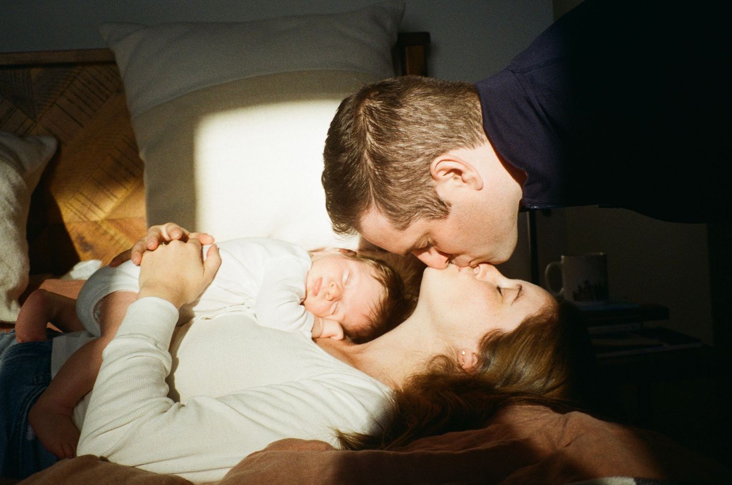 documentary newborn photography capturing early days of parenthood with soft, nostalgic aesthetic