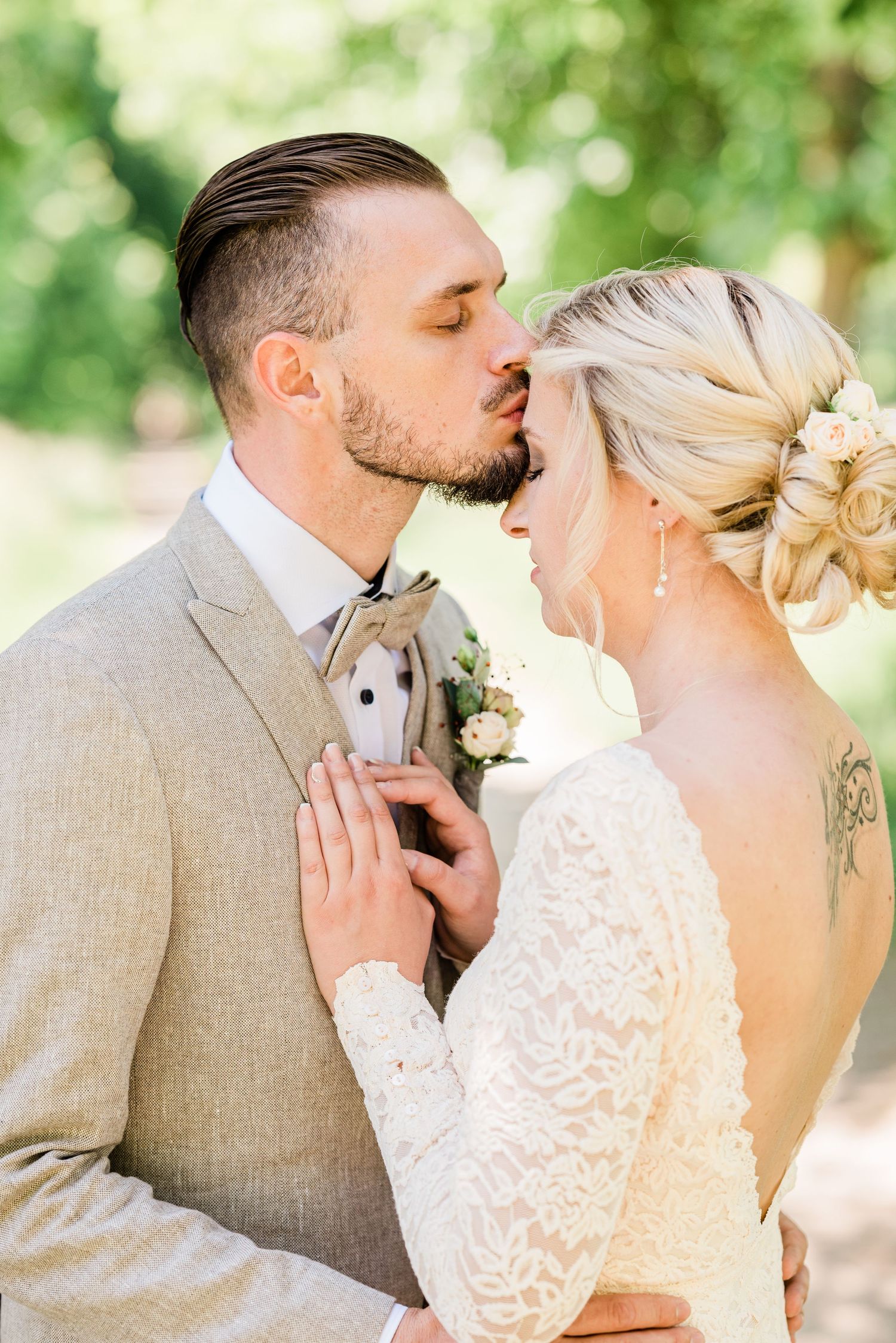 Groom kissing his bride after the wedding in Nyon, Switzerland