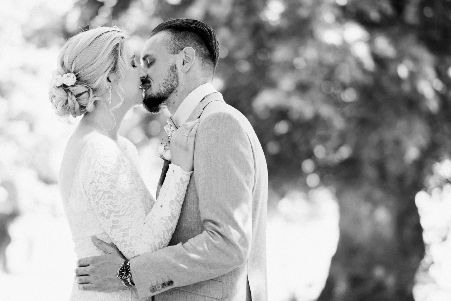 Groom kissing his bride after the wedding in Nyon, Switzerland
