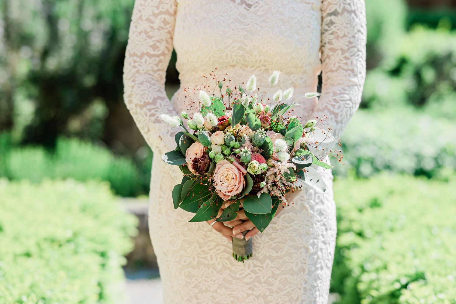 Bride holding bouquet of flowers in Nyon, Switzerland