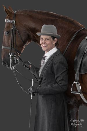 Elegant dressage portrait featuring a bay horse and rider in formal attire. Sonya Helm Equine Photography, Bristol, TN