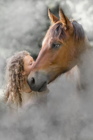 Artistic portraits of a brown horse and person in misty atmospheric lighting creating a romantic mood.
