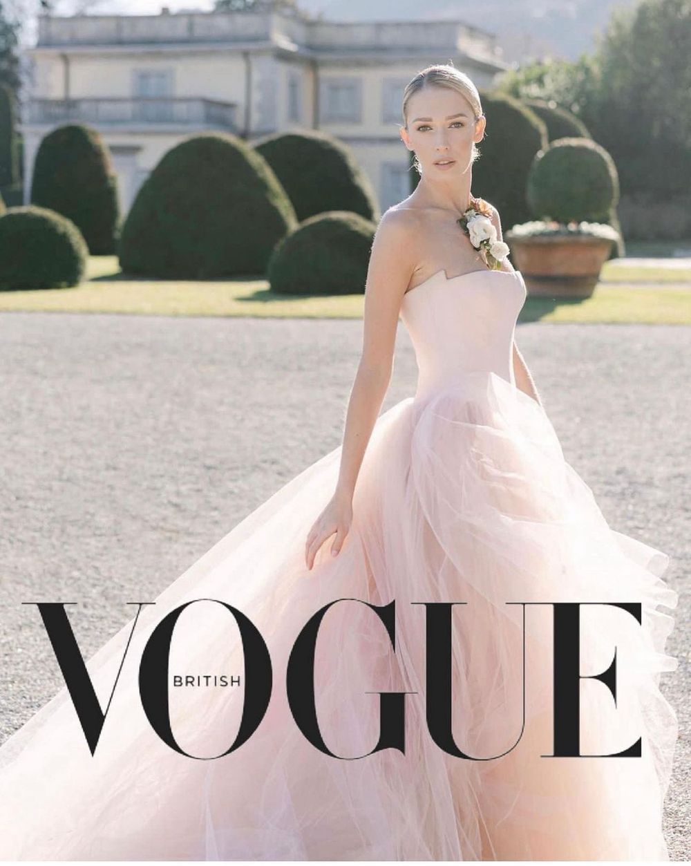 Elegant white wedding dress photographed in a Vogue magazine style against a grand estate backdrop. Photoshoot by Venice Photographer Alina