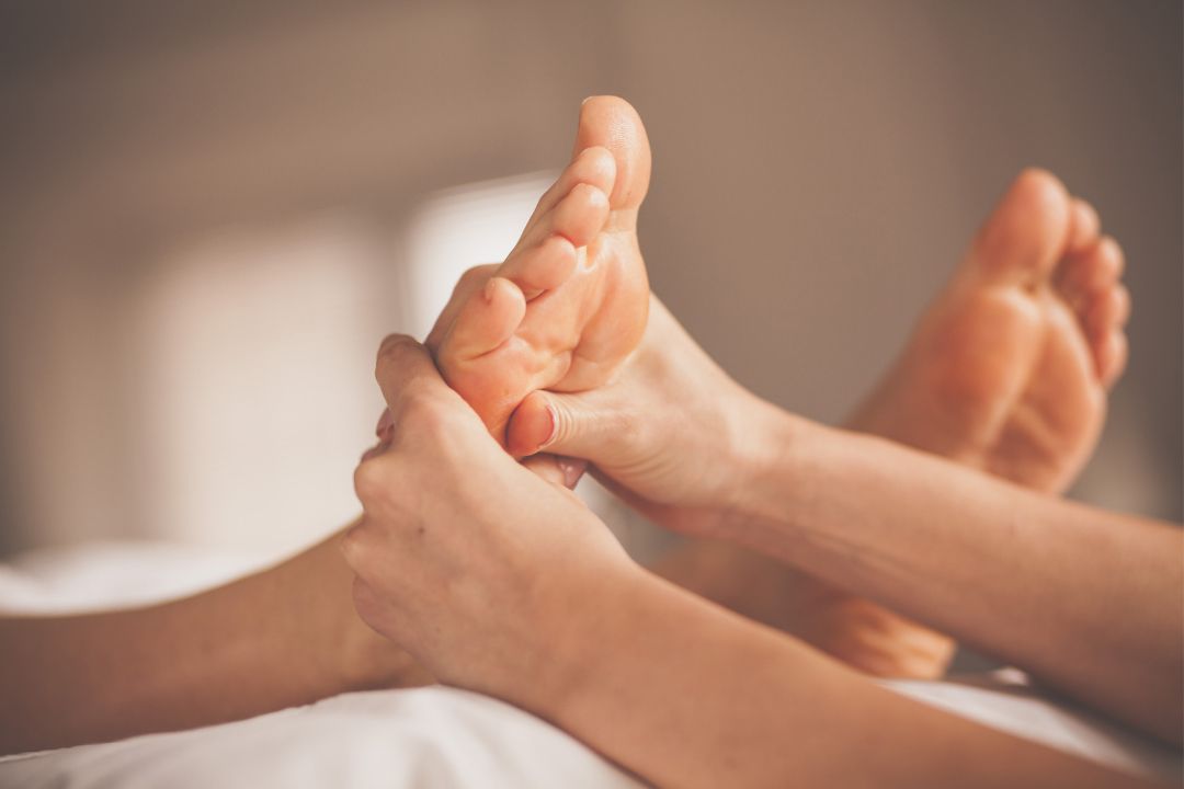 feet receiving reflexology
