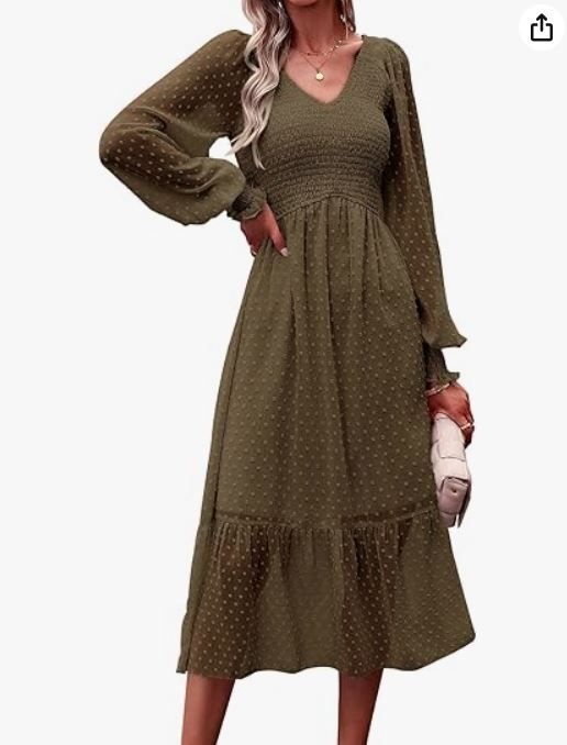 Olive green smocked midi dress with balloon sleeves and textured fabric.