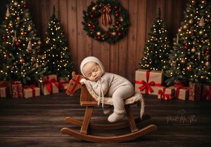 Christmas scene with newborn on rocking horse. Greenville SC newborn photographer. - Easley Sc newborn photographer. Greenville SC photos