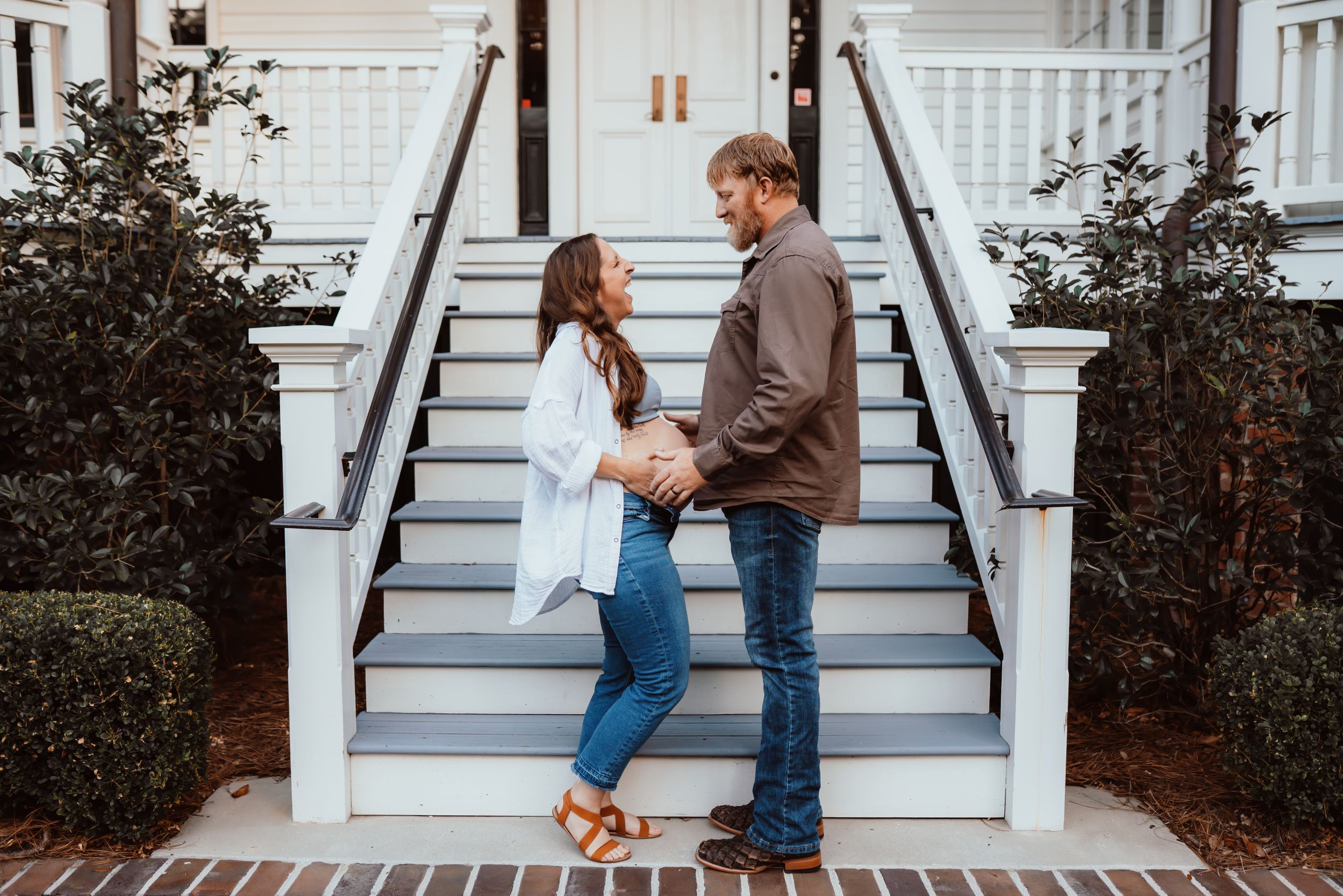 Laughter being pregnant during couples portraits, maternity.