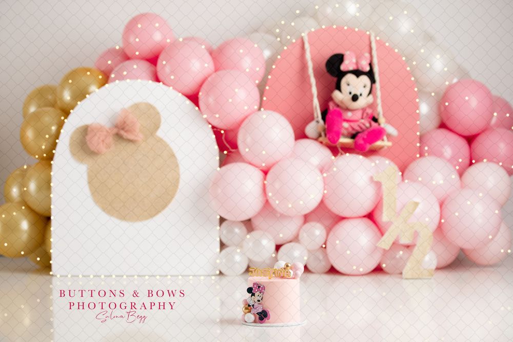 Pink and gold wedding reception decor features soft glowing lights and romantic balloon garlands, Cake smash, brisbane, minnie mouse, Disney