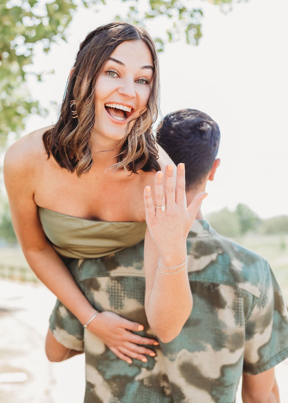 Engagement shoot with the bride showing off her engagement ring