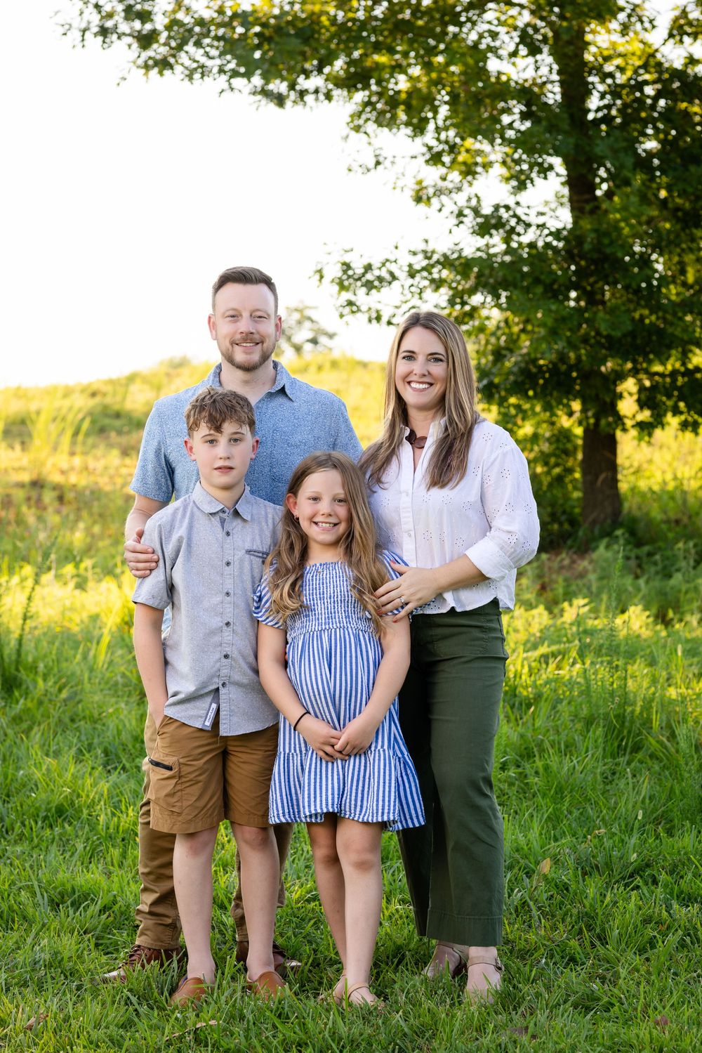 Family of four during a family reunion session in Mountain Home, Arkansas