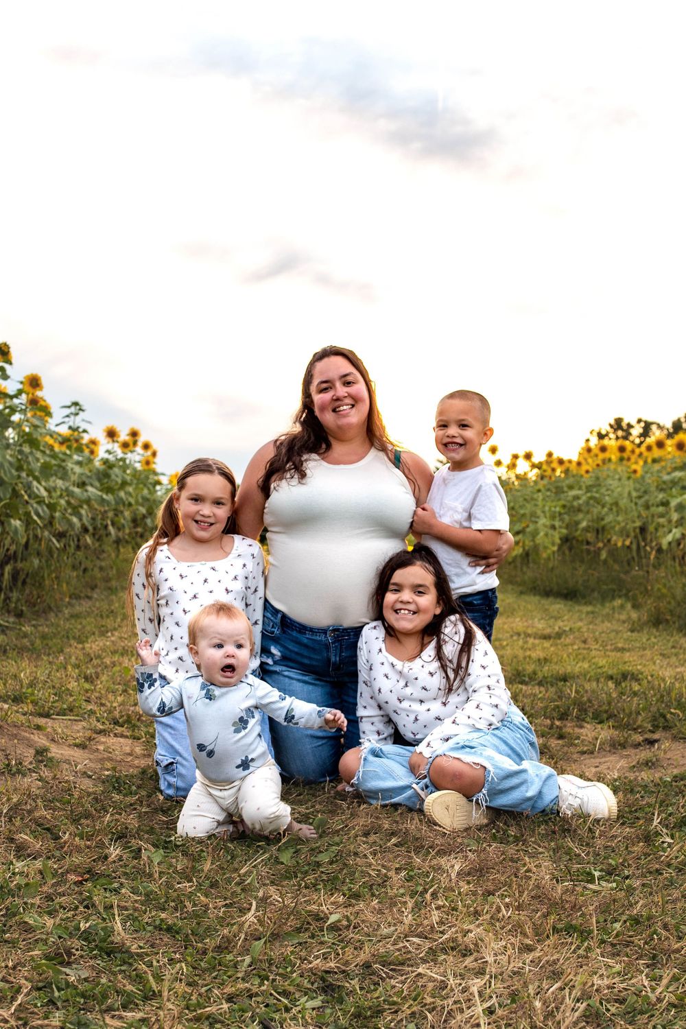 Glo Photo and Design captures sunset family photography session at Medina Sunflower fields