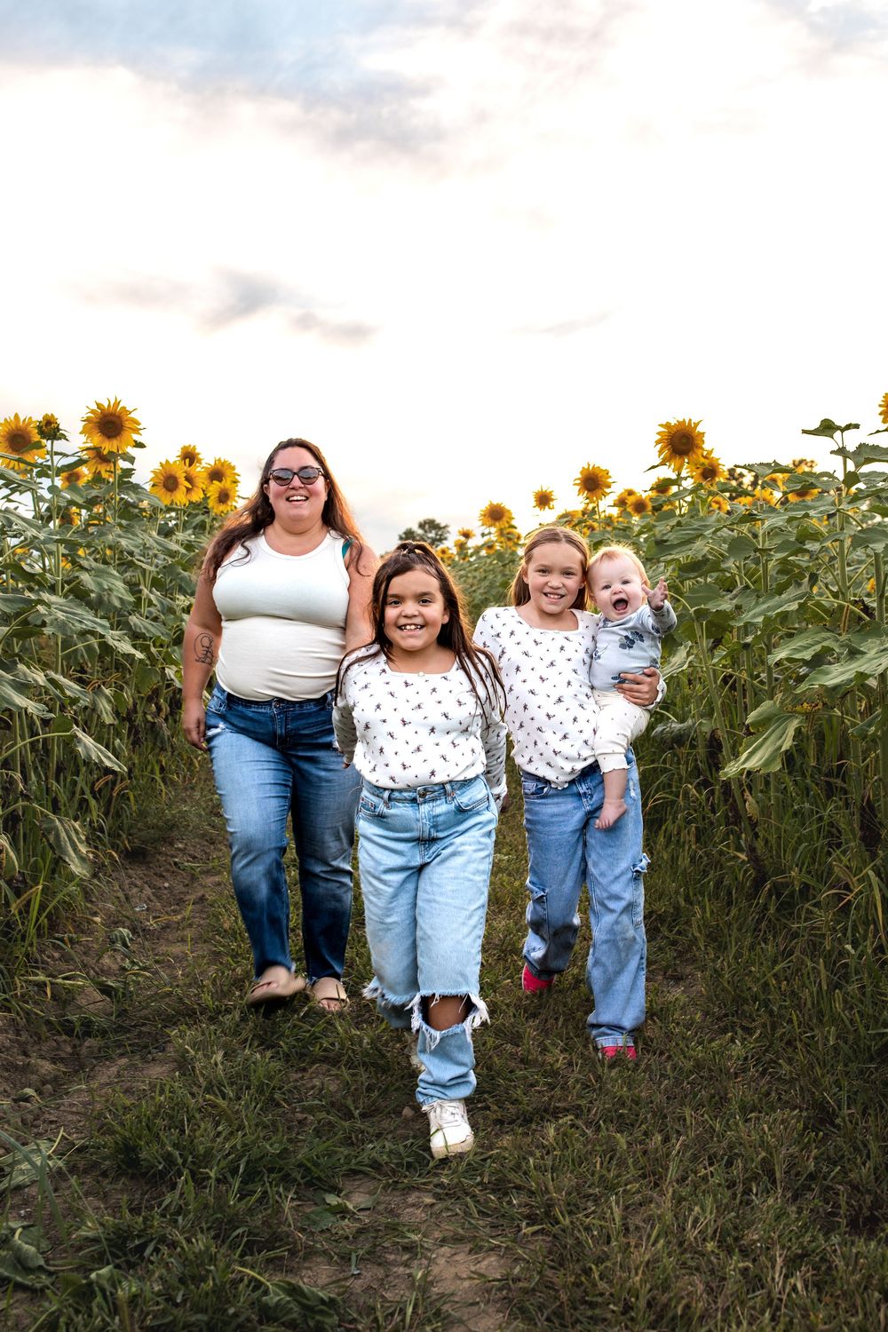 Glo Photo and Design captures sunset family photography session at Medina Sunflower fields