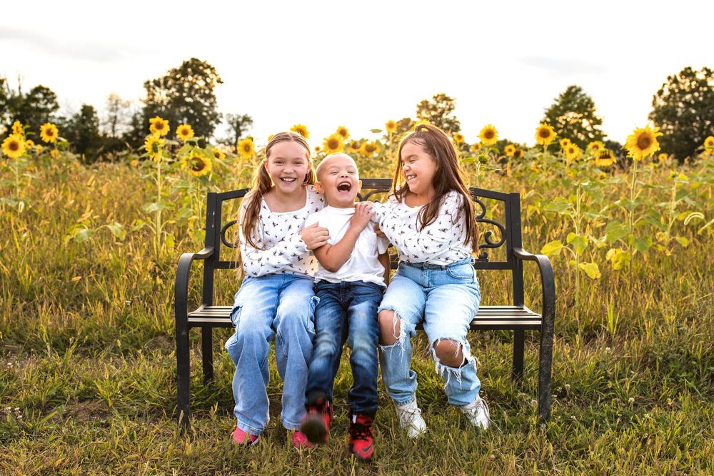 Glo Photo and Design captures sunset family photography session at Medina Sunflower fields