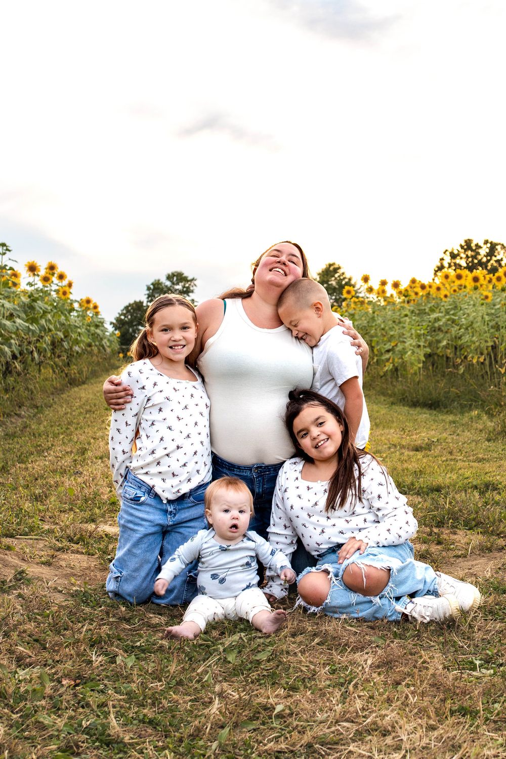 Glo Photo and Design captures sunset family photography session at Medina Sunflower fields