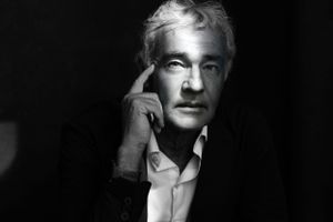 Black and white moody portrait of Massimo Giletti