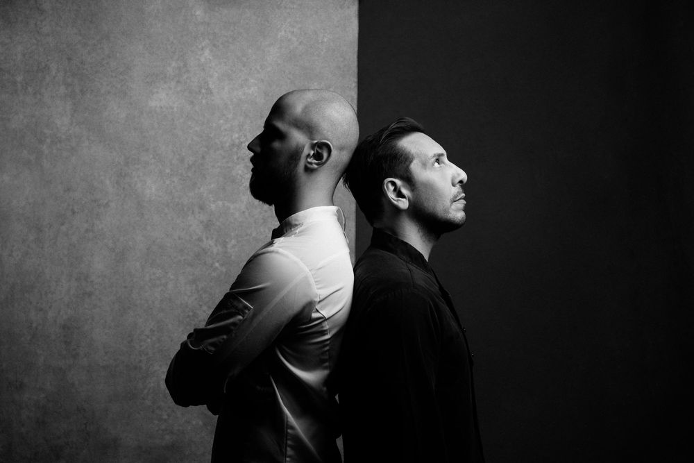 A dramatic black and white photo series shows a person looking up at different angles against a dark background.