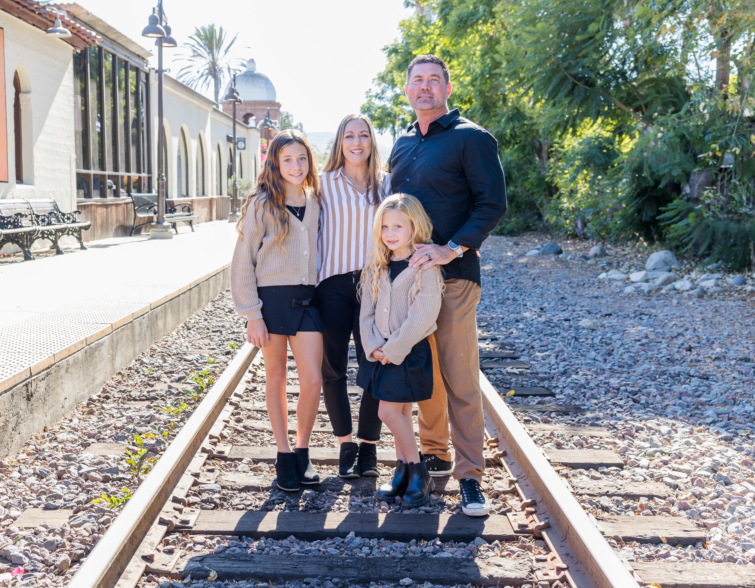 Family session on the train tracks at San Juan Capistrano