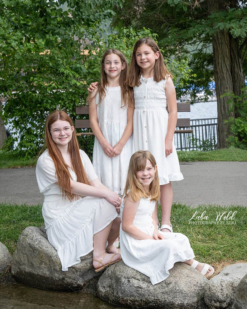 sisters and cousins portrait of girls wearing white dresses in Coeur d Alene photographer luba wold