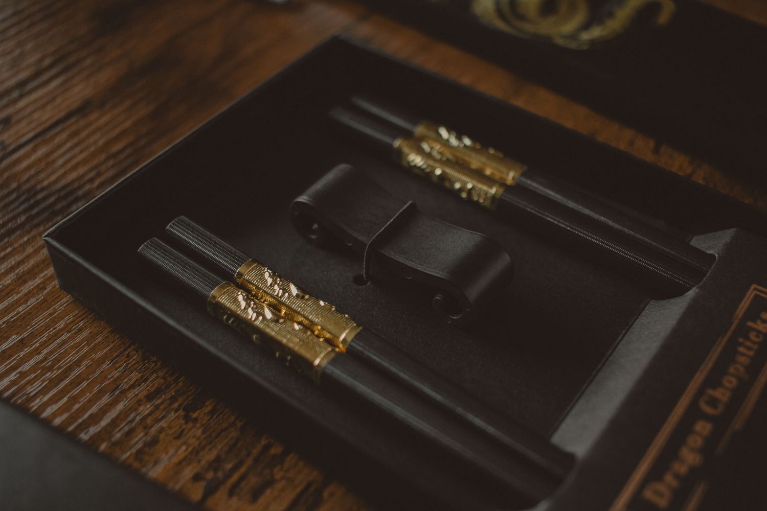 product photography, brand, branding, small business, lifestyle, still-life, moody, dark, chopstick, chopsticks, dragon, ramen, gift set
