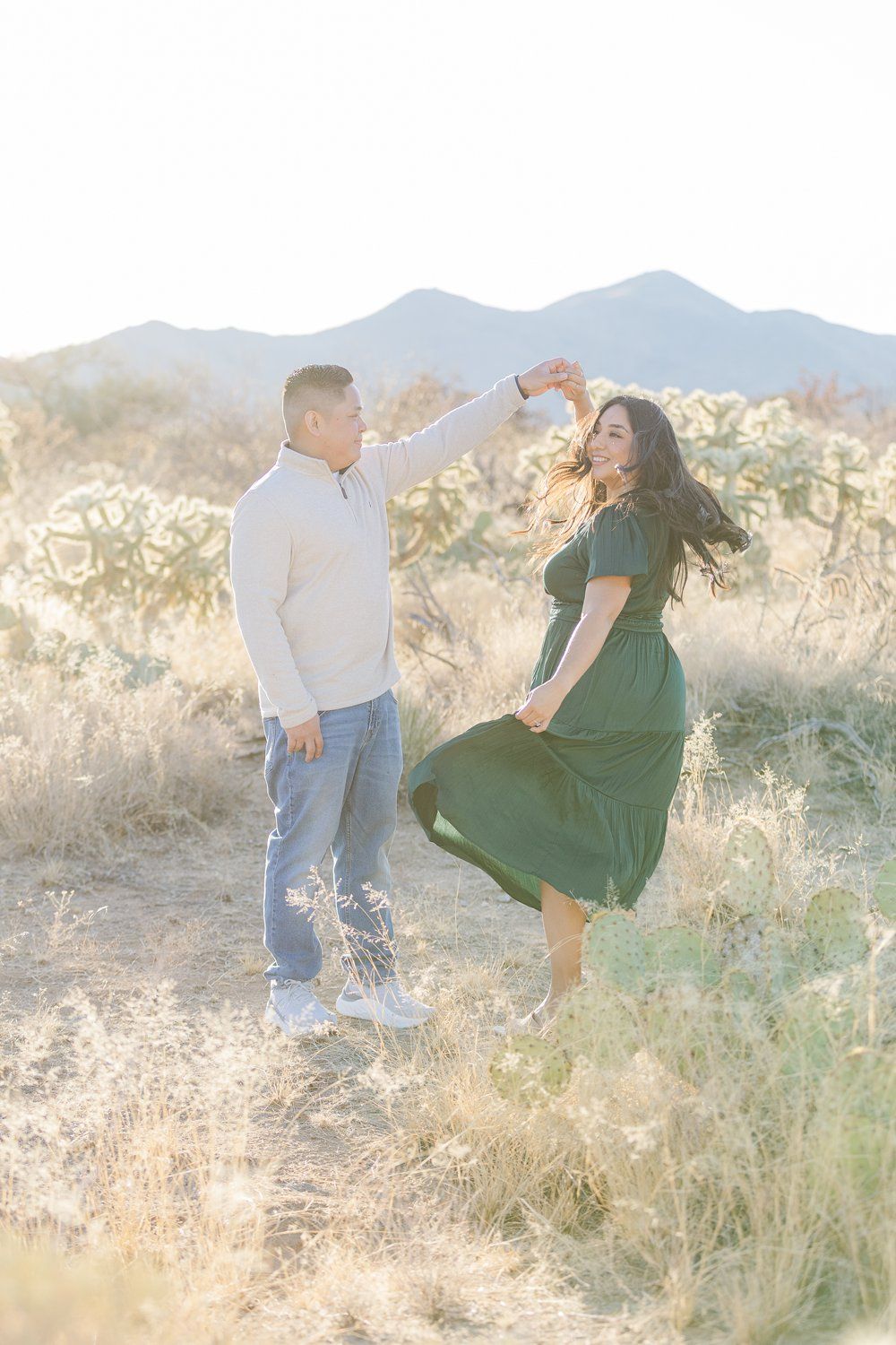 Romantic couple portrait in the golden Tucson desert at sunset