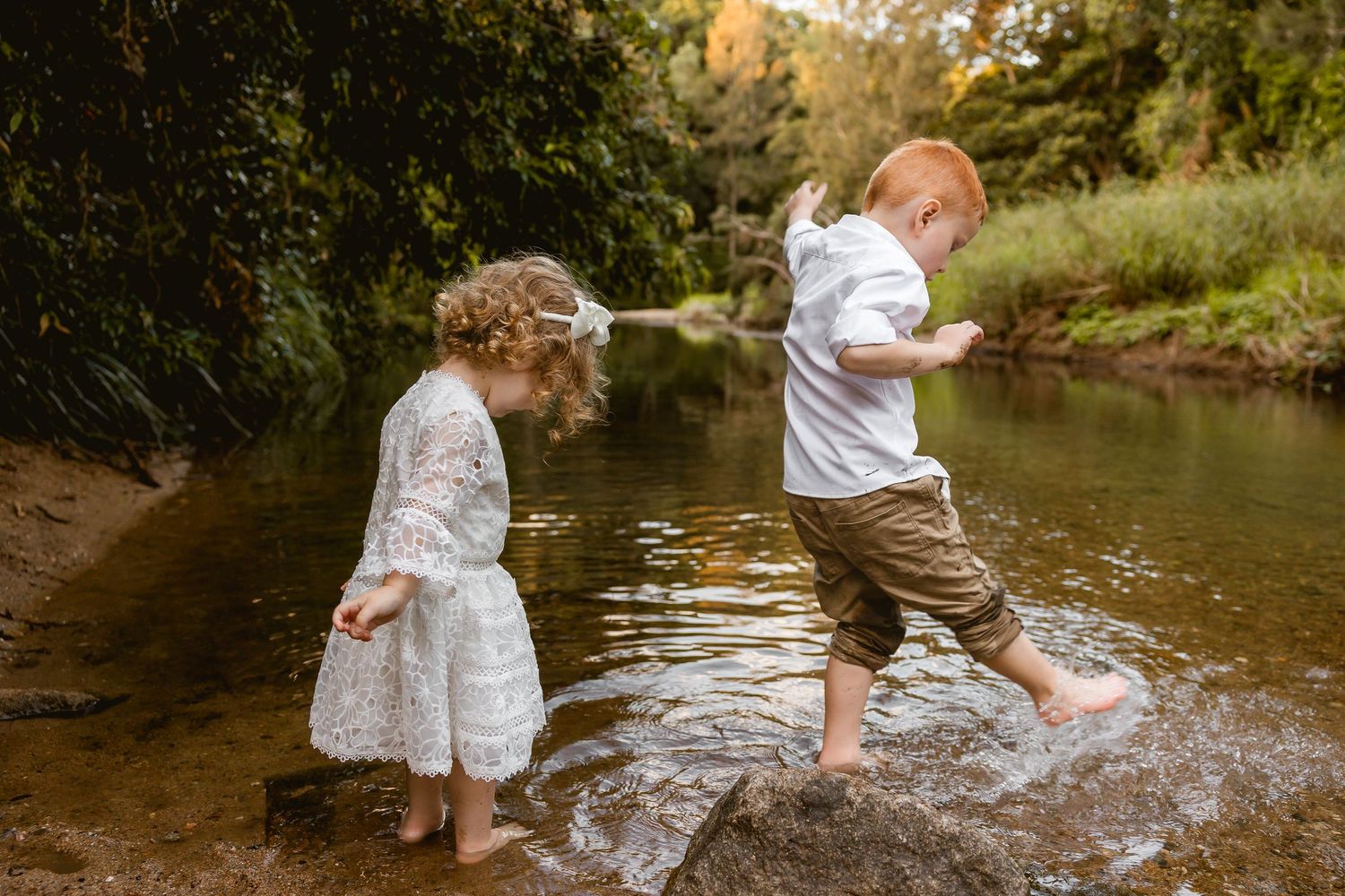 Natural outdoor family photo captured at a Brisbane beachside location