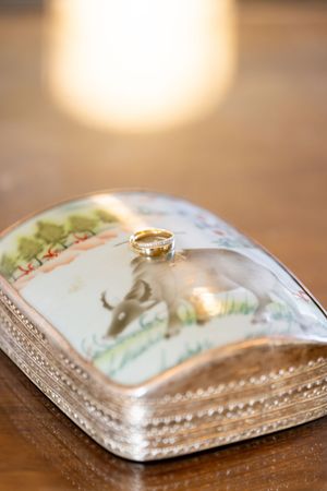 Close up of wedding ring on family heirloom box on Oahu.