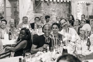 A collage of black and white photographs showing people dining and socializing at tables during an event.