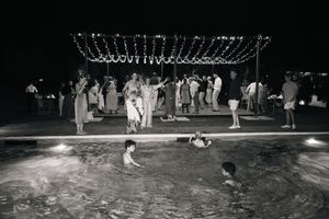 Black and white photographs showing a sequence of figures performing a dance routine on a stage.