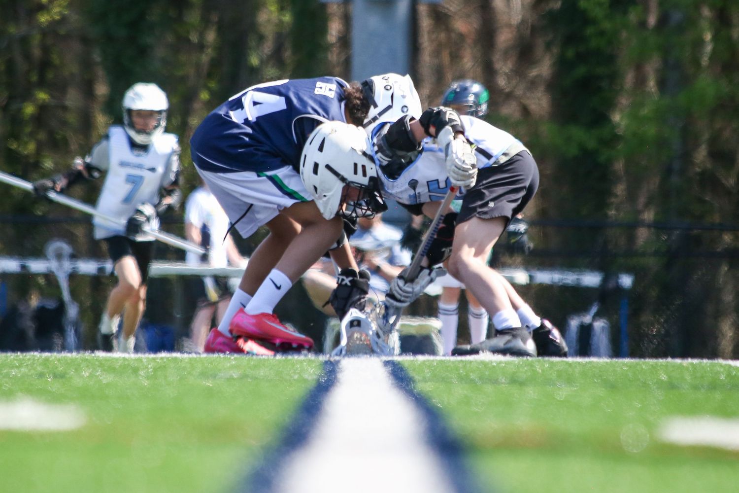 Harrison High School Youth Lacrosse team center field during a face off.  Sports Photography, Action Photography