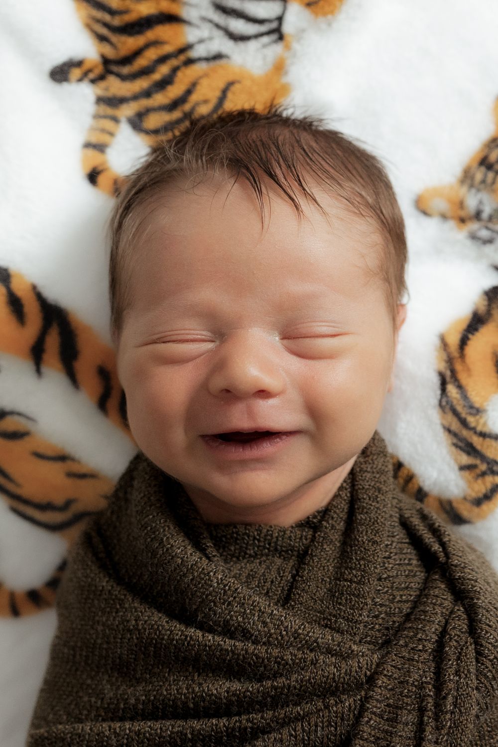 in-home lifestyle newborn photographer session in Columbia Missouri