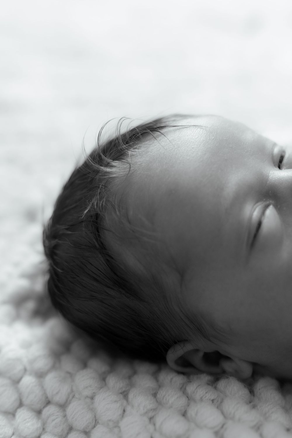 in-home lifestyle newborn photographer session in Columbia Missouri
