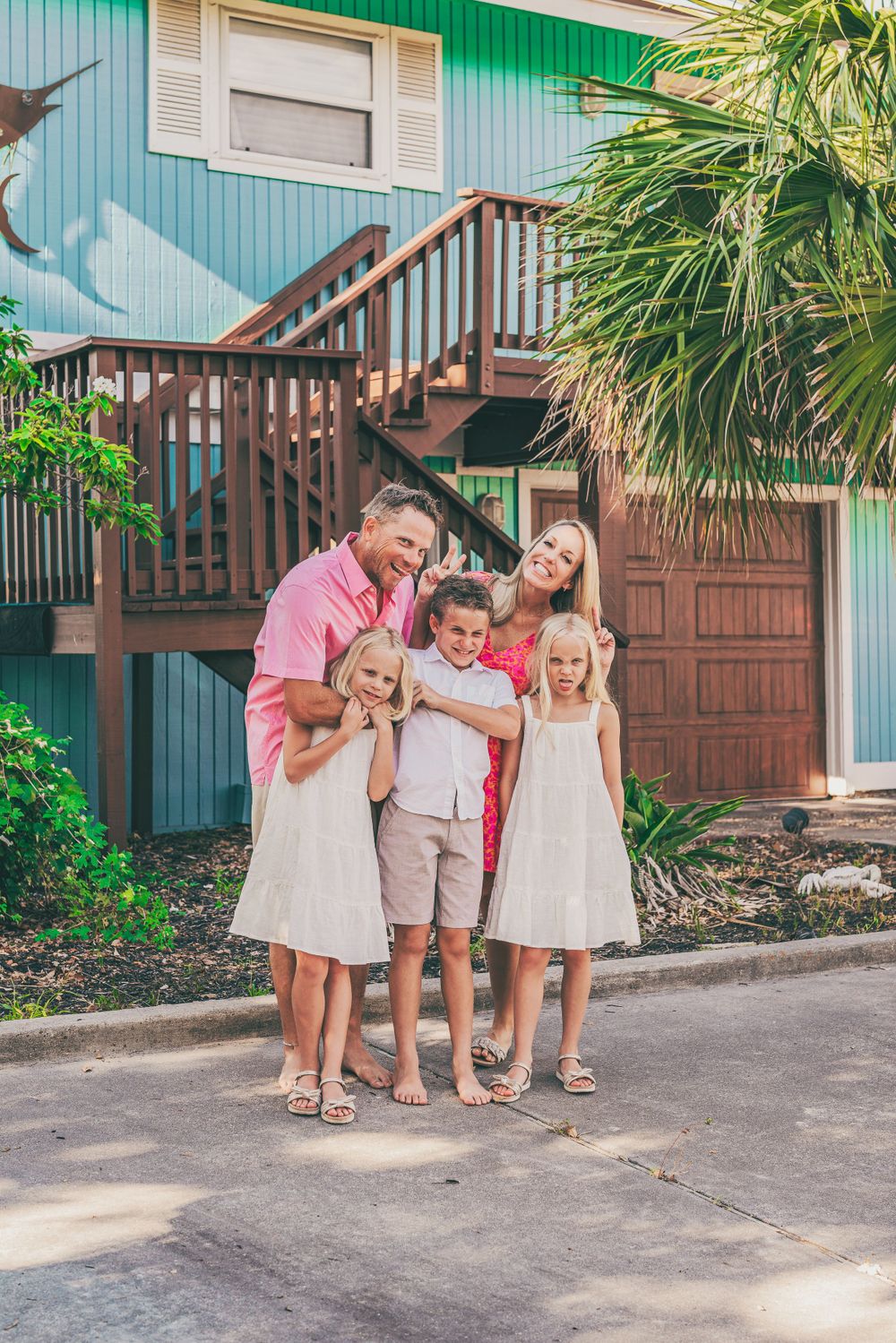 Family of five acting goofy and Rockport, Texas