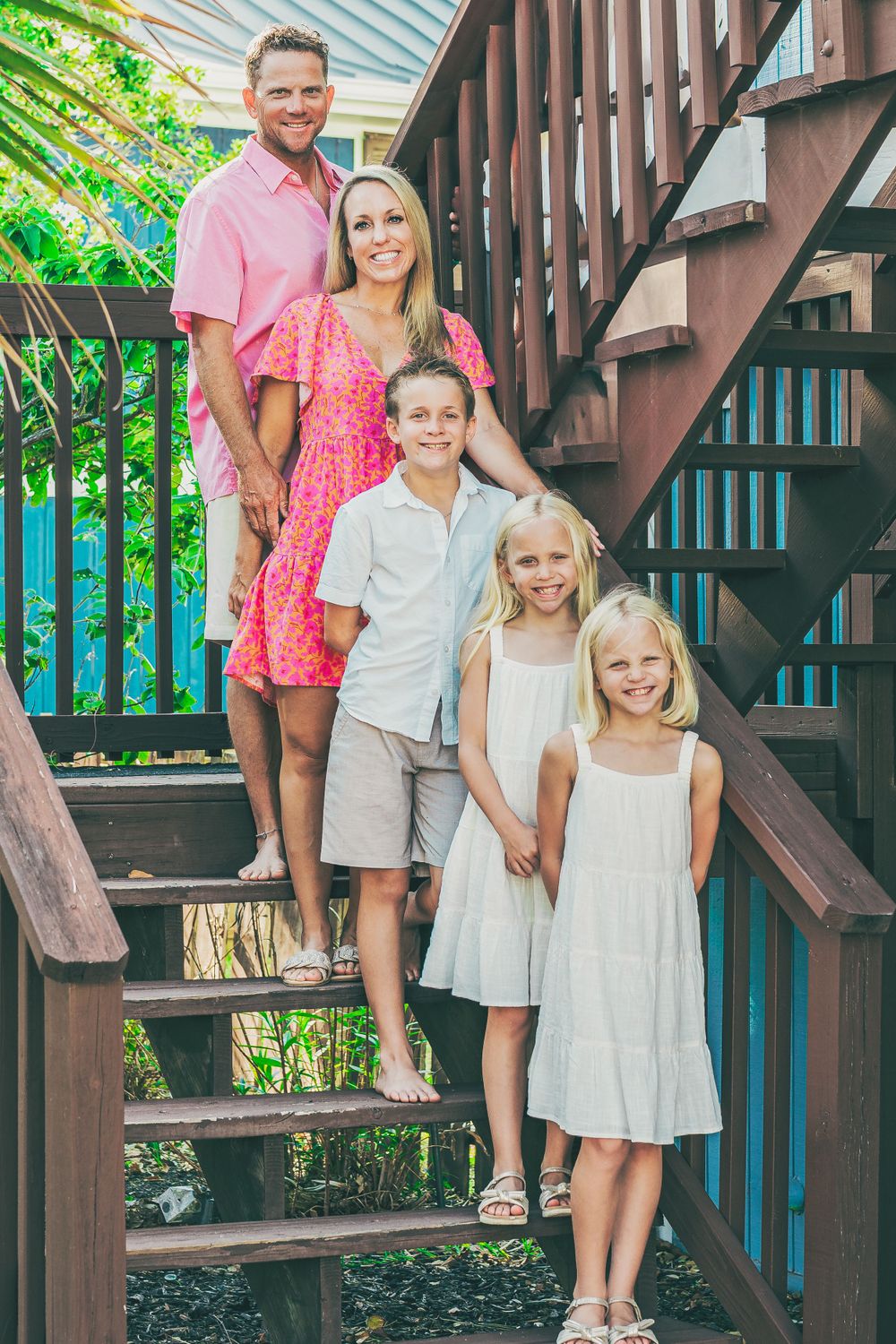 Family of five standing on stairs in Rockport, Texas