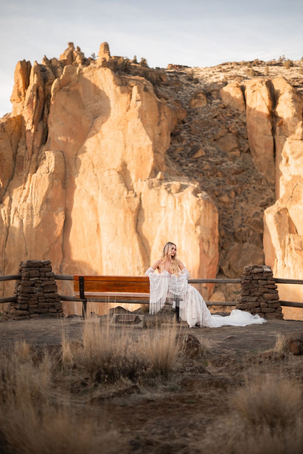 A bridal portrait session at an ancient stone ruin during sunset.