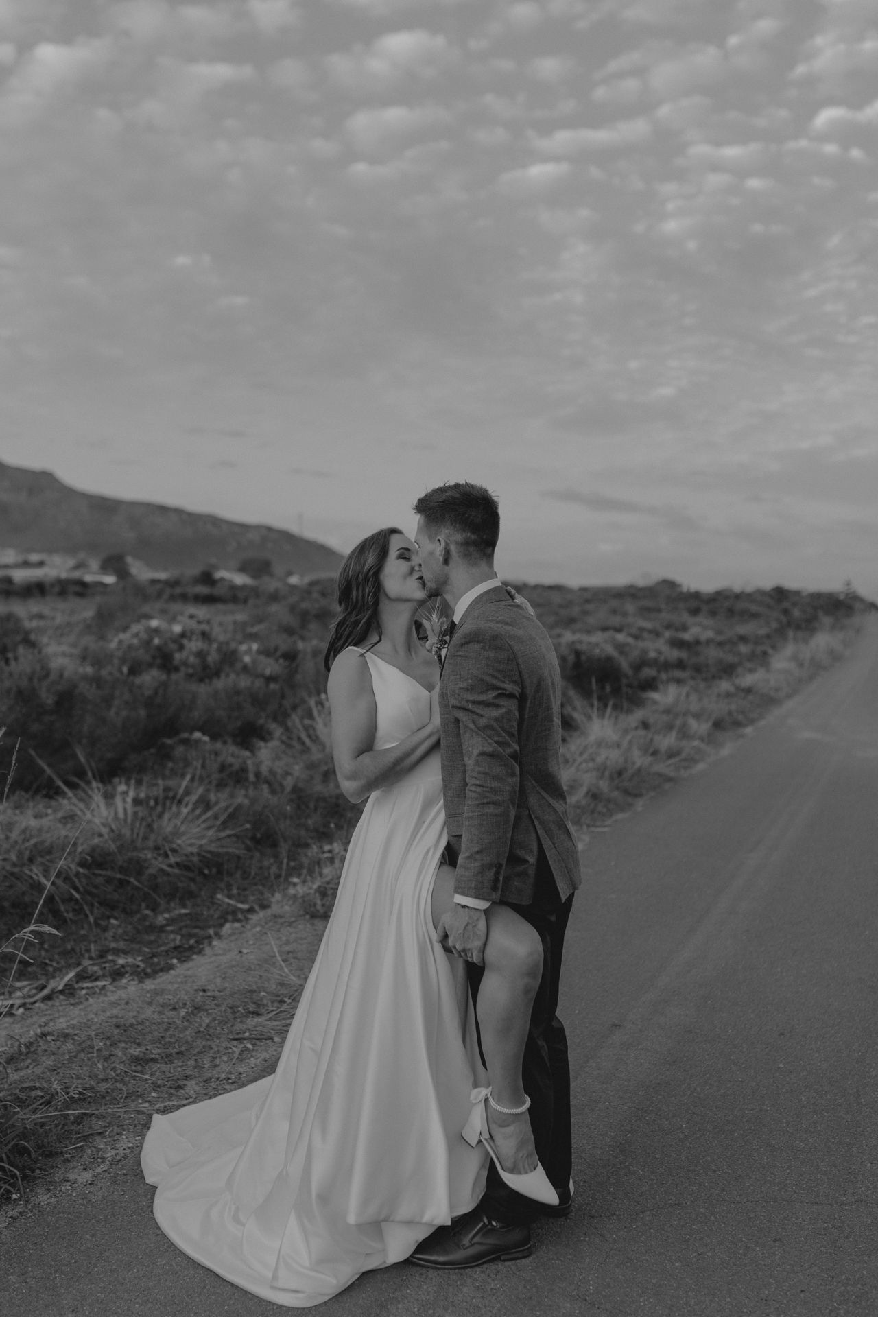 beach wedding. groom. bride. kissing. wedding photographer. cape town wedding. beach wedding