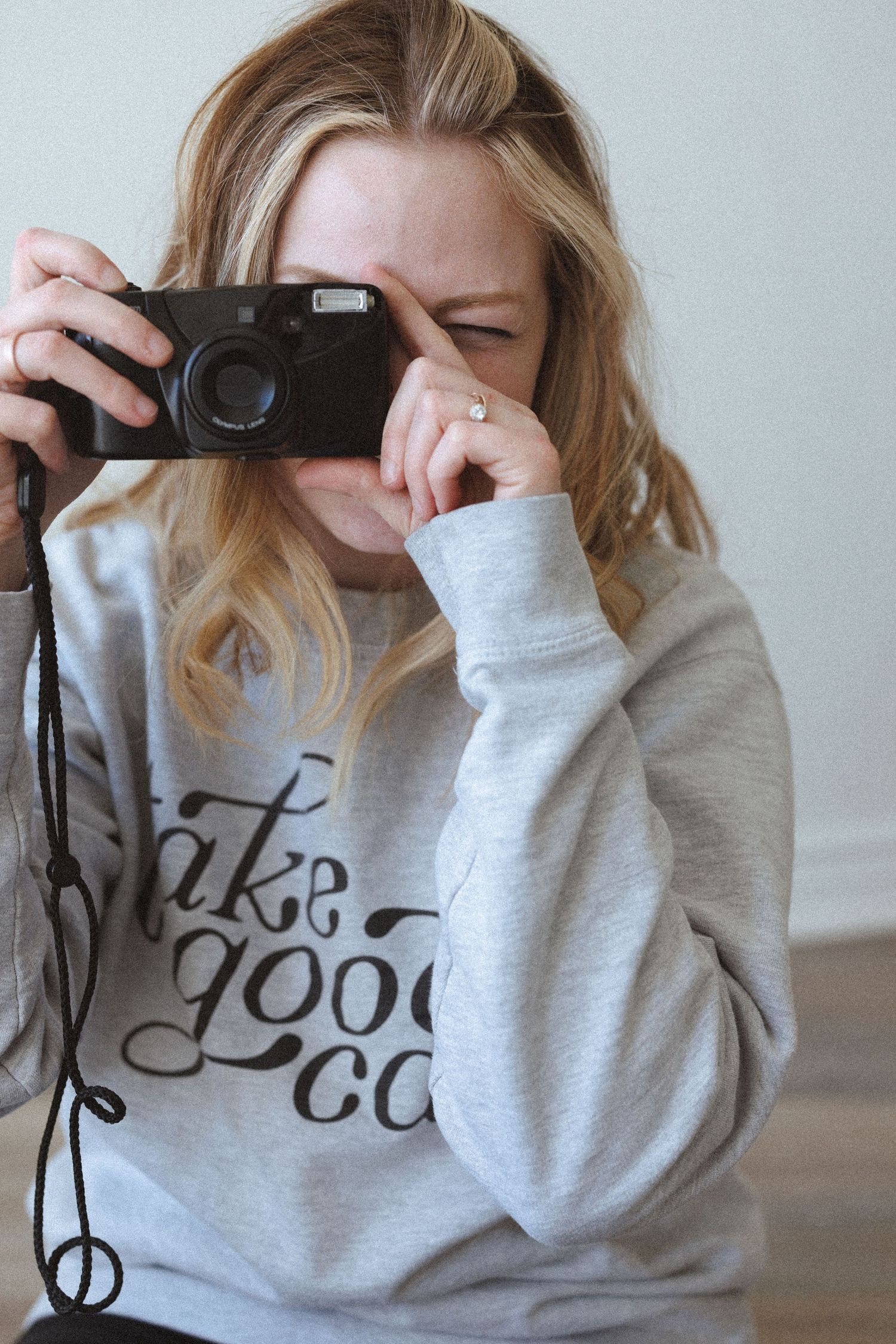 headshot of photographer with camera