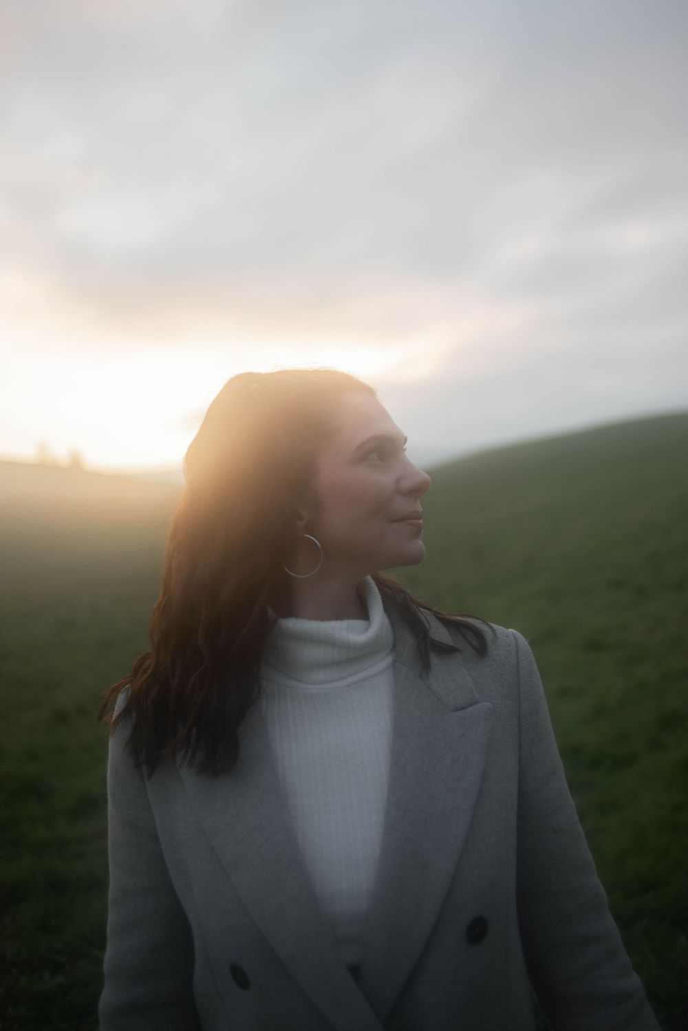 Outdoor portrait series at sunset with soft natural lighting.