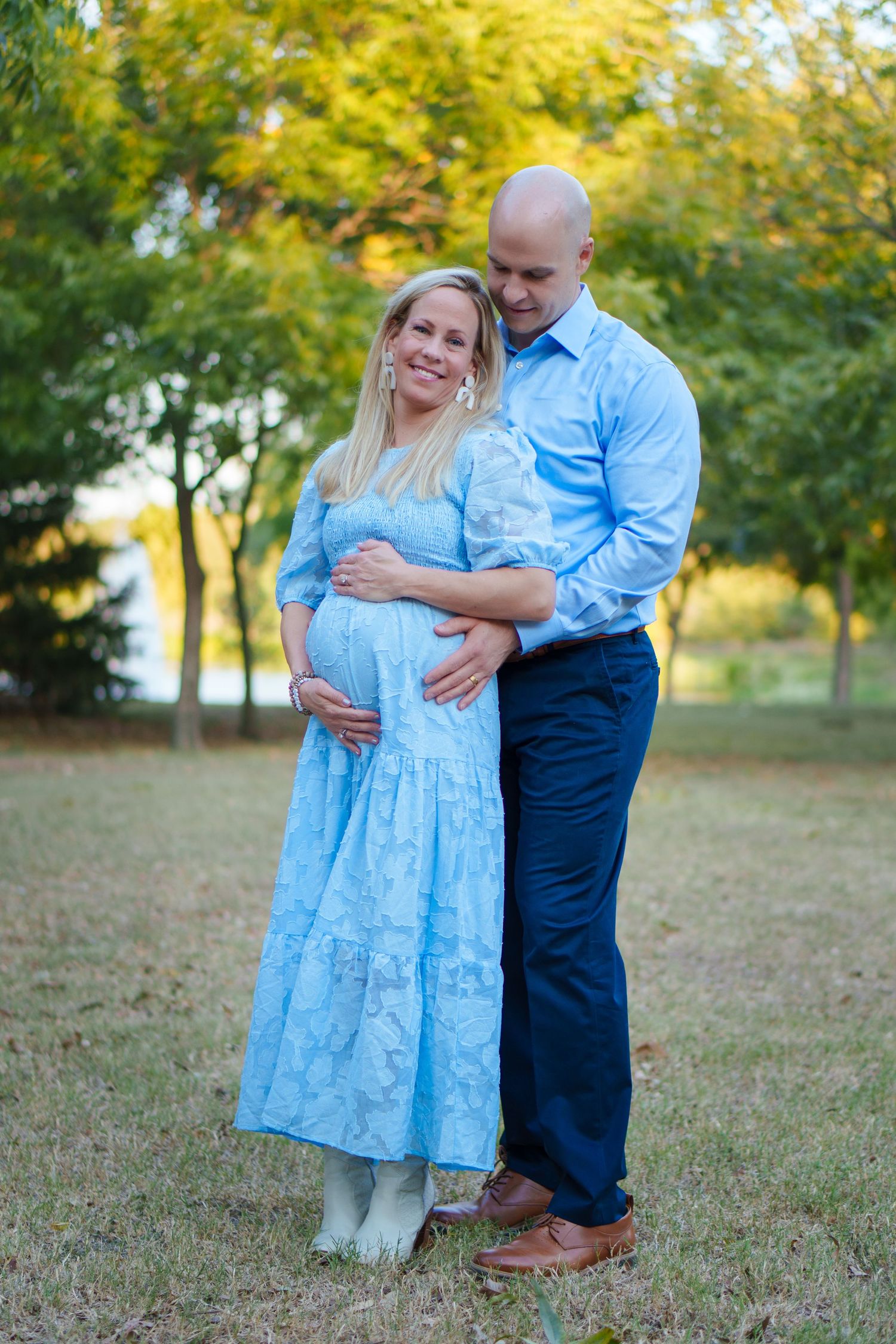 maternity photo session fall family mini baby boy shoes expecting husband love Keller town Center TX sunset expecting growing family big sis