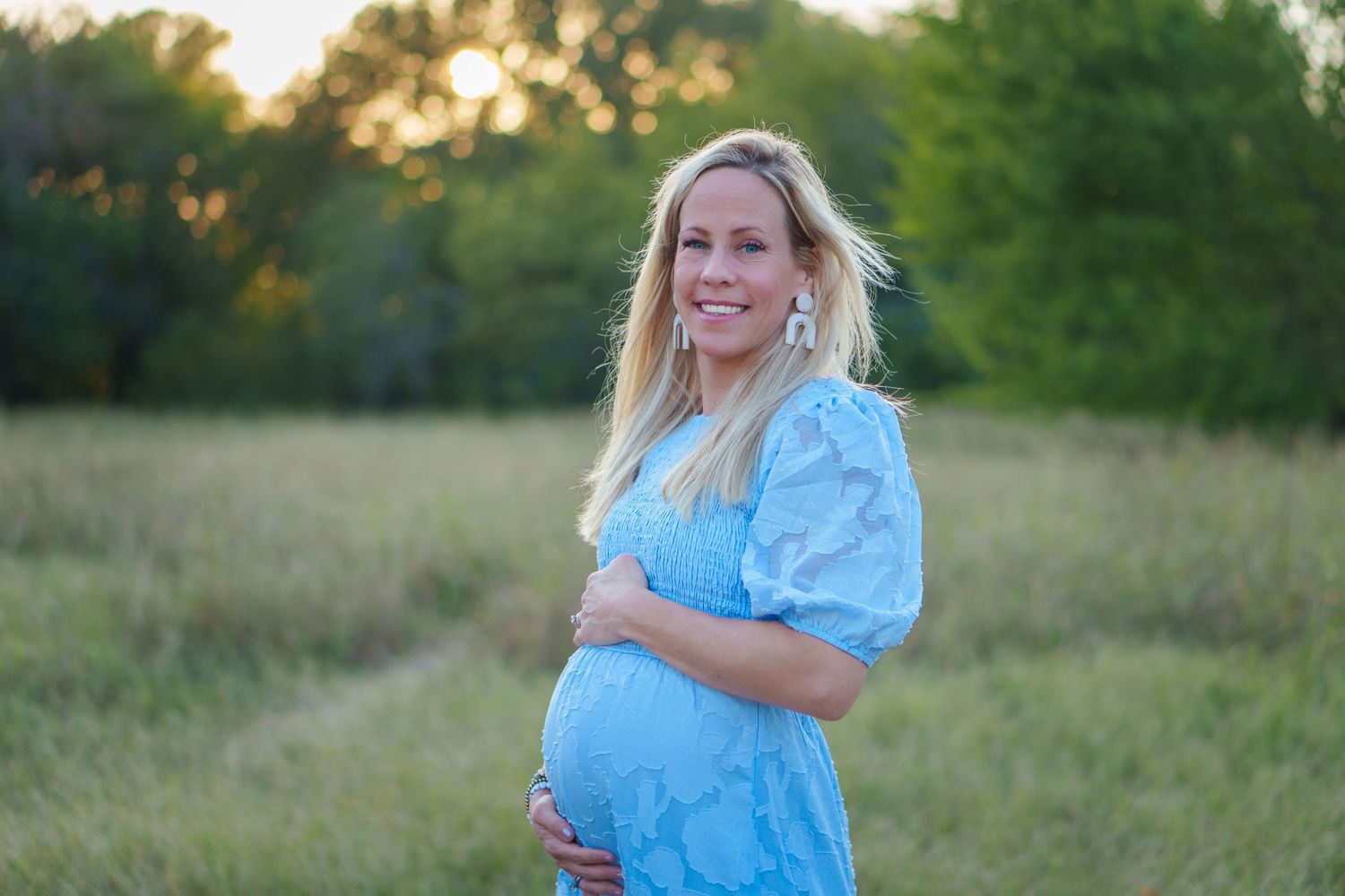 maternity photo session fall family mini baby boy shoes expecting husband love Keller town Center TX sunset expecting growing family big sis