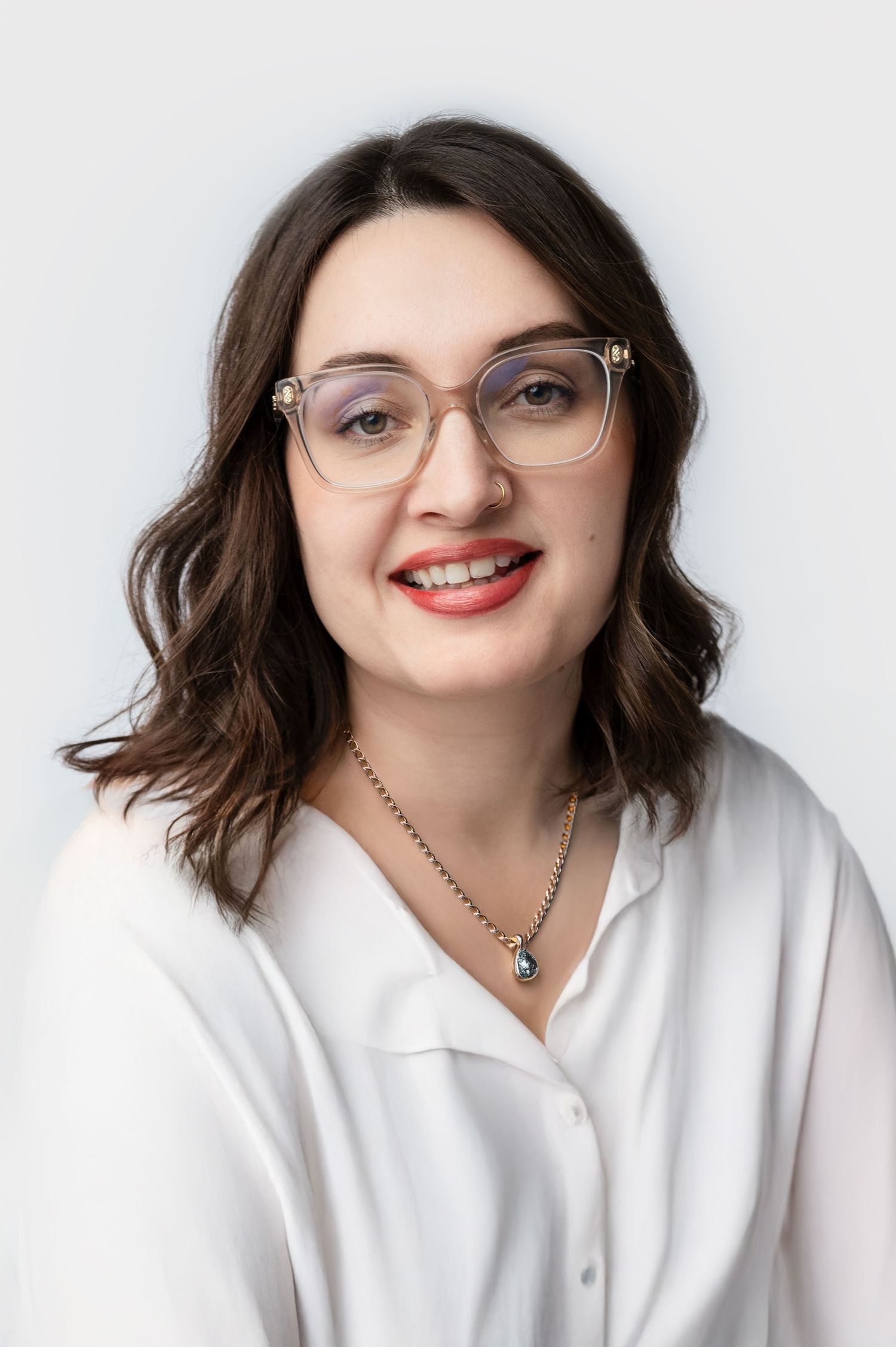 Professional headshot of woman in business attire with soft studio lighting – Woodbury MN headshot photographer