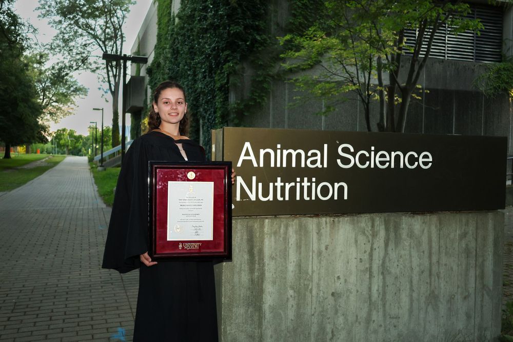 Girl in front of sign