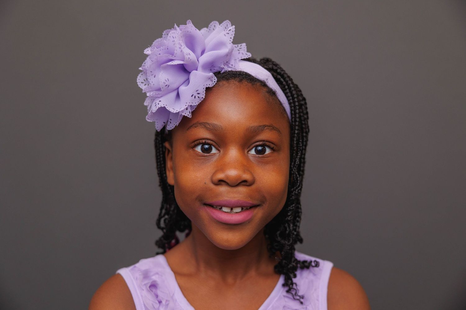 Girl smiling for school photos in Grapevine, TX