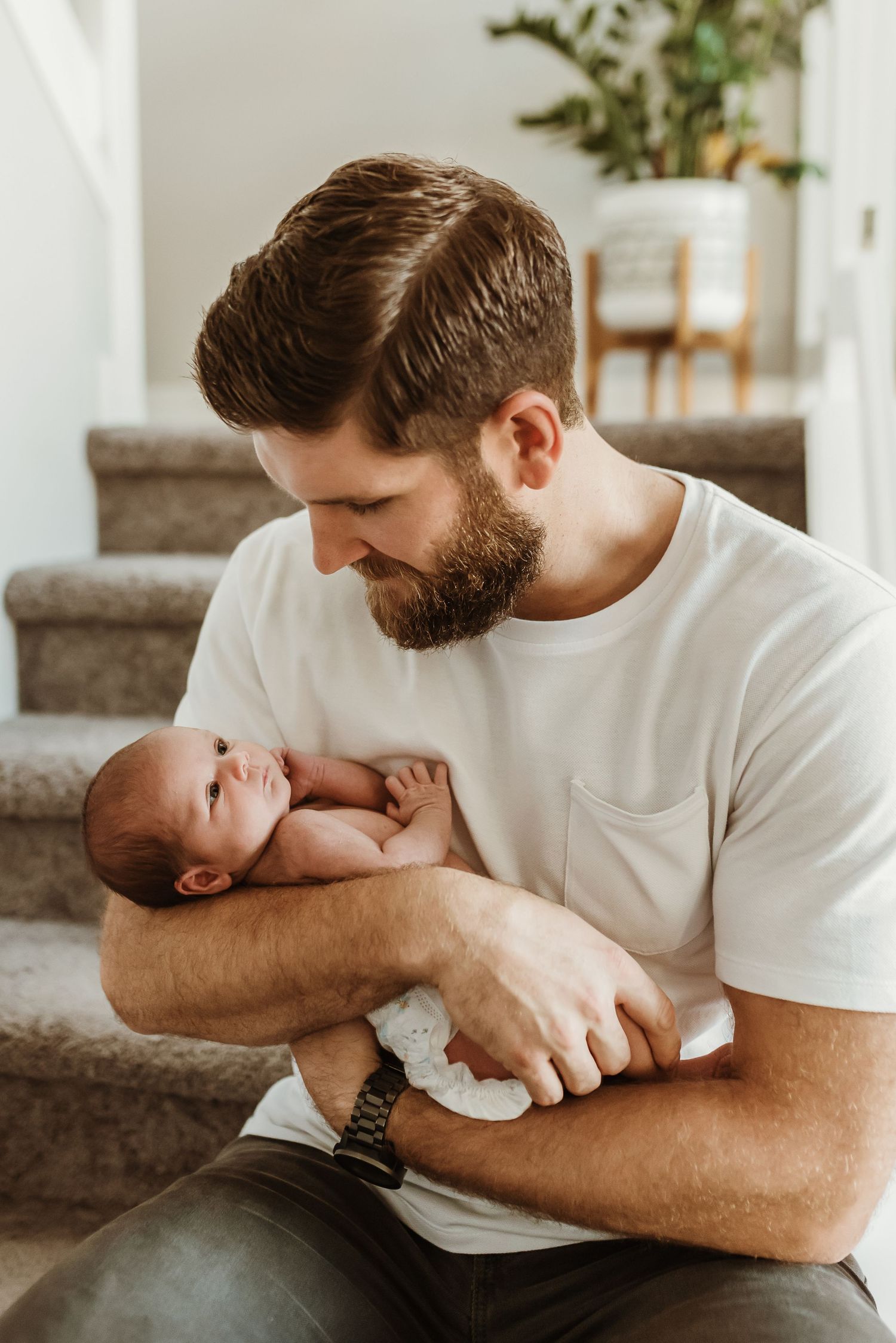 dad with newborn baby