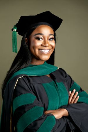Graduation photo series in black and green academic regalia showing joyful expressions.